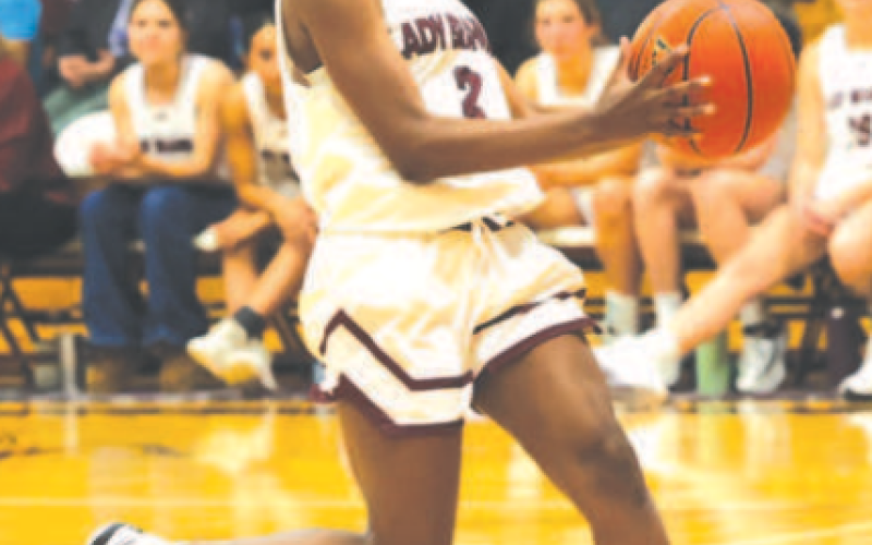 T’Andra McAfee goes in for a lay up against Rice. Chuck Grafe/Tribune-Herald