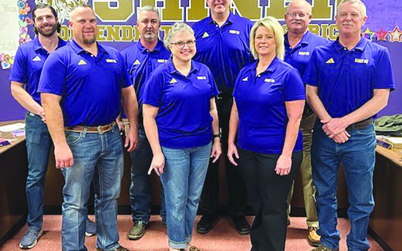 SISD school board members were recognized for “School Board Appreciation Month.” Pictured are, left to right, are board members Bucky Boehm, Jared Boedeker, Tommy Schuette, Julie Gamez, Superintendent Alex Remschel, board members Michelle Werner Mendel, Vice President Tim Kalich, and President Dan Stafford. Photo by Clayton Kelley.