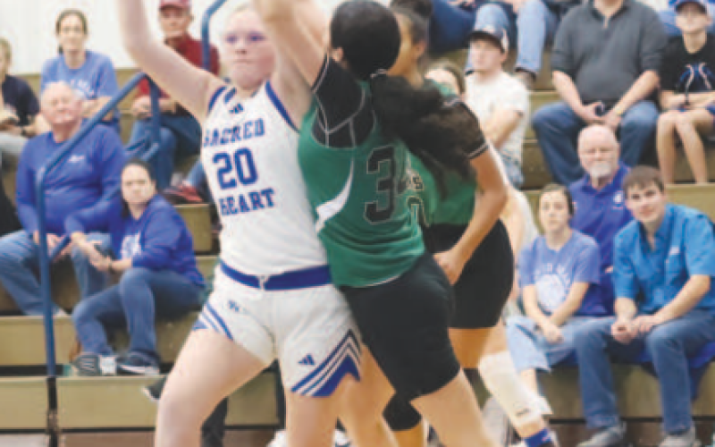 Ashton Schaefer looks to make an outlet pass during the victory here Friday. Chuck Grafe/Tribune-Herald