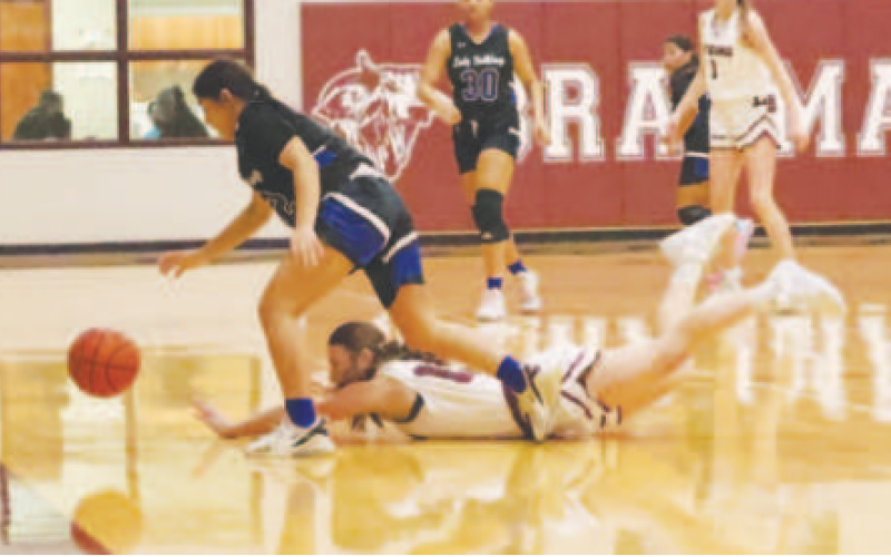 Addison Matula dives for a lose ball vs. Yoakum. Chuck Grafe/Tribune-Herald