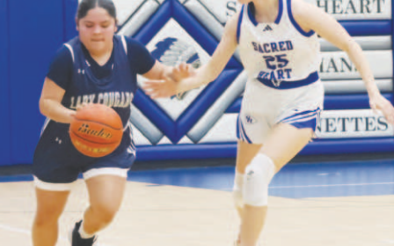 Catherine Lemonds on defence in the VFA win. Chuck Grafe/Tribune-Herald