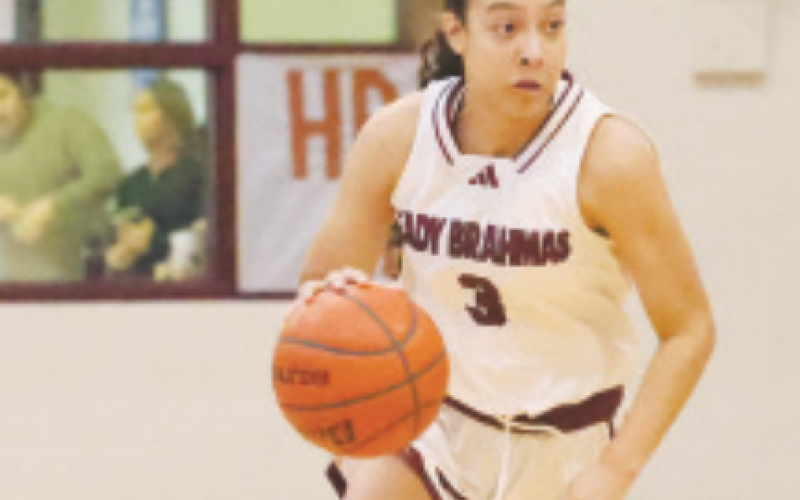 Kasey Harper looks down court durning District 25-AAA game against Edna. Chuck Grafe/Tribune-Herald