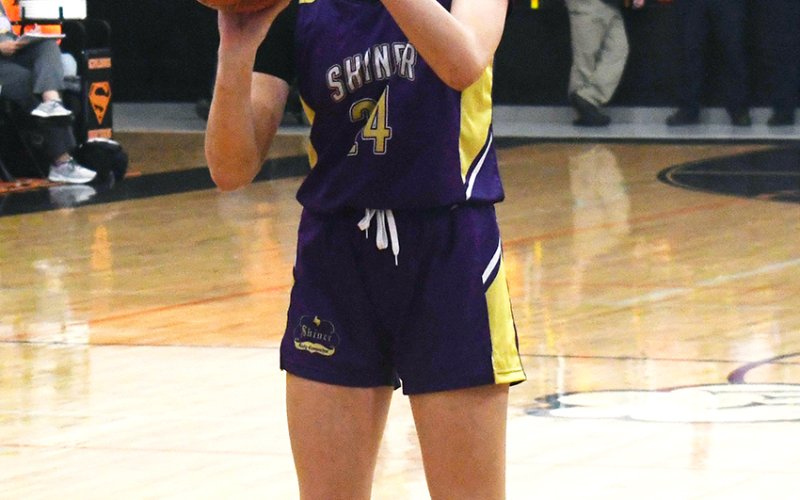 Kallee Kifer lines up for a free throw against Schulenburg. Photo by Mark Lube.
