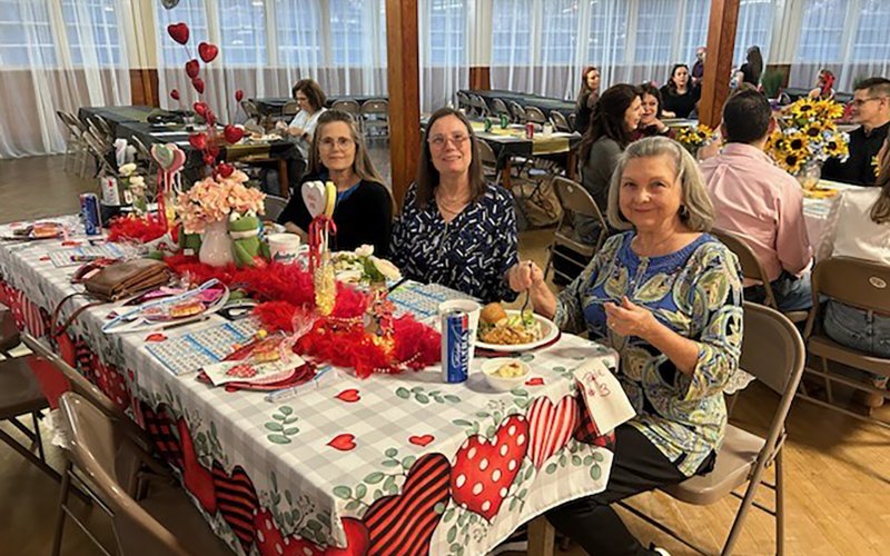 A Valentine's theme table decorated for the contest of best decorated table.