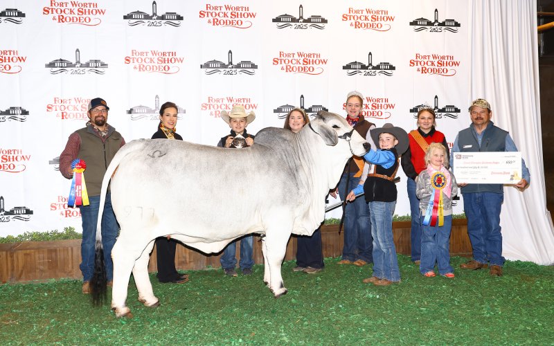 Kaston is shown with members of his family and representatives of the Fort Worth Stock Show and Rodeo.