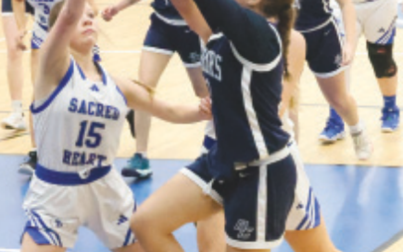 Allie Clark on defense against Bracken Christian.. Chuck Grafe/Tribune-Herald