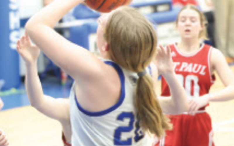 Ashton Schaefer right, scores in the third quarter. Chuck Grafe/Tribune-Herald