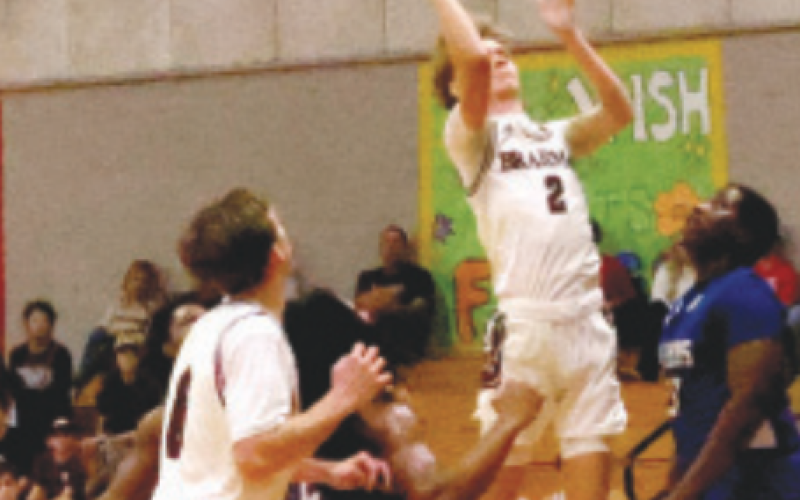Landry Brown scores against Rice Consolidated. Chuck Grafe/Tribune-Herald