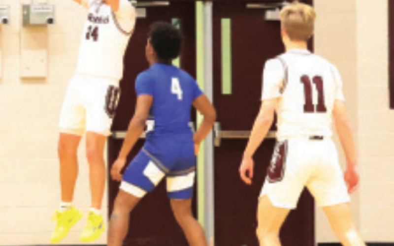 Kason Podhajsky shoots vs. Rice Consolidated. Chuck Grafe/Tribune-Herald