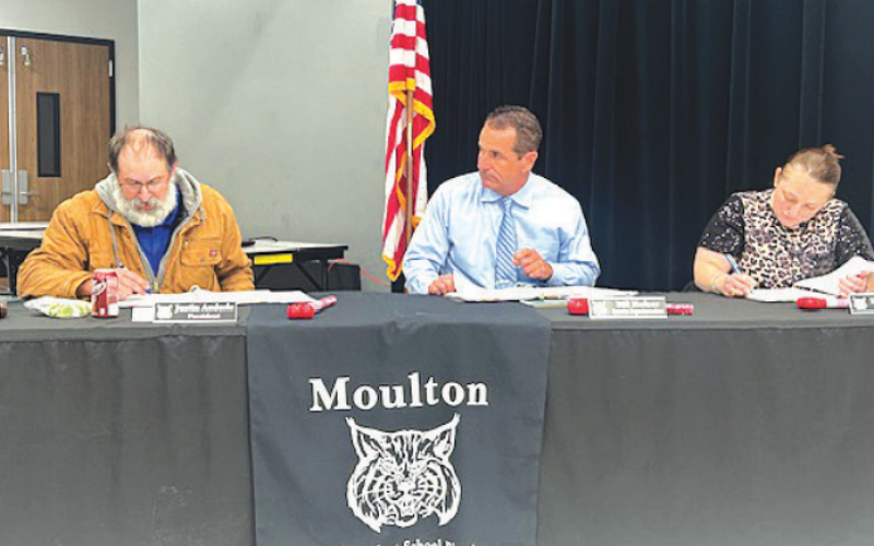 Pictured, center, is Interim Superintendent Bill Hefnur. Photo by Clayton Kelley