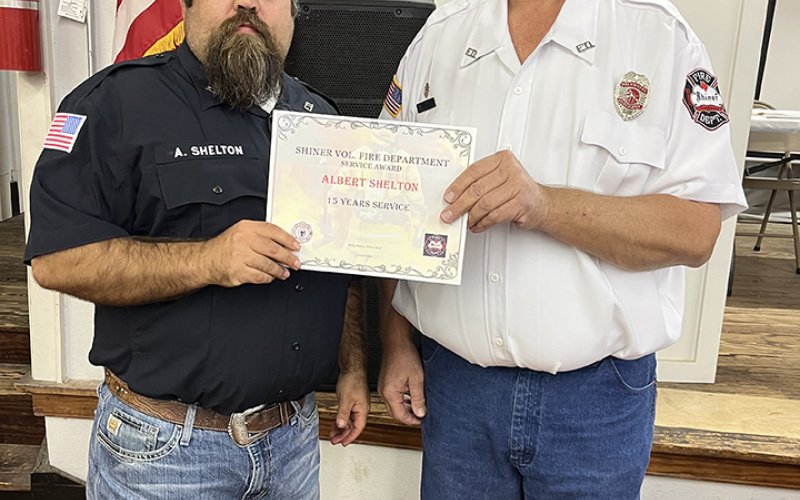 Albert Shelton (15 years), left, and Daniel Muehlstein, president of the SVFD.