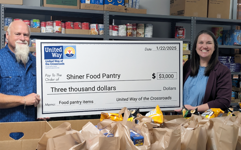 Pictured is Shiner Methodist Church Pastor and Shiner Food Pantry director, Darin Zumwalt and United Way of the Crossroads Executive Director, Bethany Castro.
