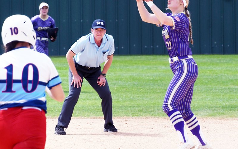 First baseman Cami Cowan waits on a pass for a putout as against Tidehaven as the batter approaches Photo by Mark Lube.
