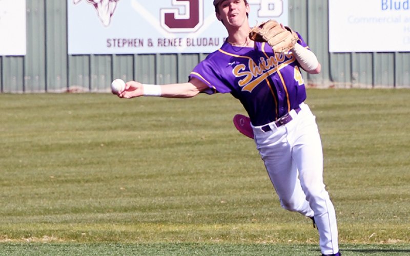 Carson Schuette makes a throw to first after fielding a ball in Thursday’s Hallettsville Tournament.