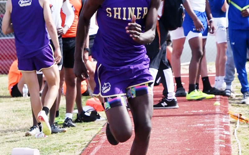 Jarvis Williams races down the runway during the long jump. He also got fourth in triple jump. Photo by Mark Lube.