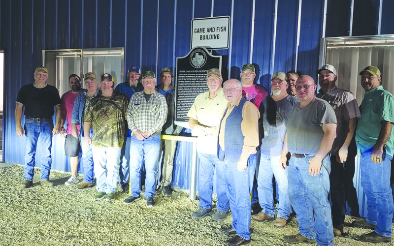 Pictured are members of the Shiner Game and Fish Protective League and Doug Kubicek with the new historical marker at the Game and Fish Building.