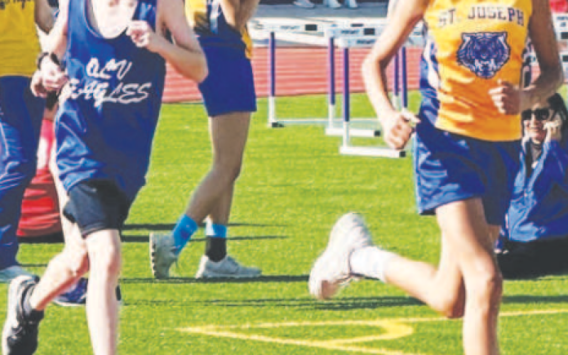 Pictured at right, Jarely Gutierrez runs a relay. Contributed photo.