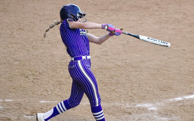 Jo Caka takes a swing on Friday against Weimar. She had two hits and scored one run, and stole one base. Photo courtesy of Louann Heinsohn.
