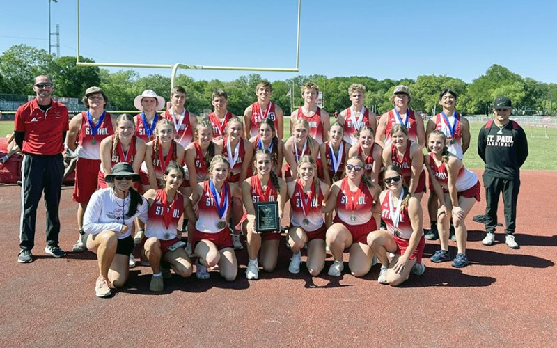 The St. Paul girls and boys track team, along with coaches Max Bergkamp, Nicco Brown and Corey Anzaldua  gather for a photo after the district meet April 7 at San Antonio Antonian College Prep. The girls got first place and the boys took second. Photo courtesy of St. Paul Booster Club.