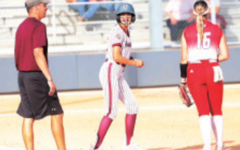 Elizabeth Felcman after a run-scoring single in the Tidehaven game Tuesday, March 25. Chuck Grafe photo