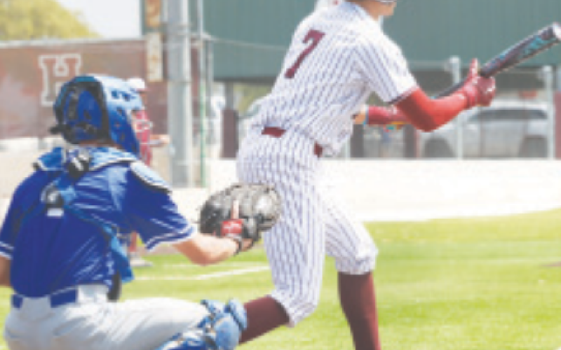 Andrew George squares around to bunt in Saturday’s game. Chuck Grafe photo