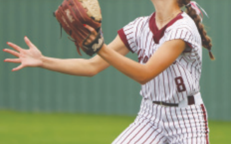 Lady Brahma right fielder Ashlyn Pustka camps under a fly ball in the loss to Columbus Friday. Photo by Chuck Grafe