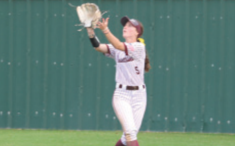 Lady Brahma center fielder Hanna Zachary catches a fly ball during the victory over Industrial here Tuesday, April 15. Photo by Chuck Grafe