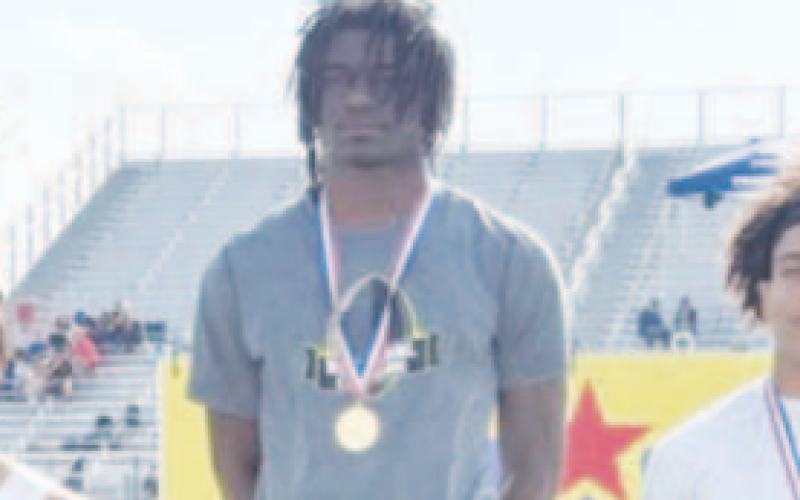 Pictured in the center is X’Zavier Barnett. He reached 45 feet, 9 3/4 inches to win the Region IV-3A boys triple jump.