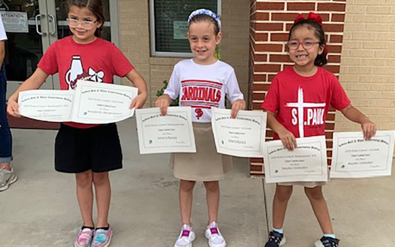 Lavaca Soil and Water Conservation District 13 selected its school-wide K through 2nd grade poster winners from Shiner Catholic School, who include from left Annabelle Montemayor (1st), Arisa Lekgegaj (2nd) and Haydee Gonzalez (3rd). Montemayor’s and Lekgegaj’s posters placed second and third at district in the K thru 2nd grade division.