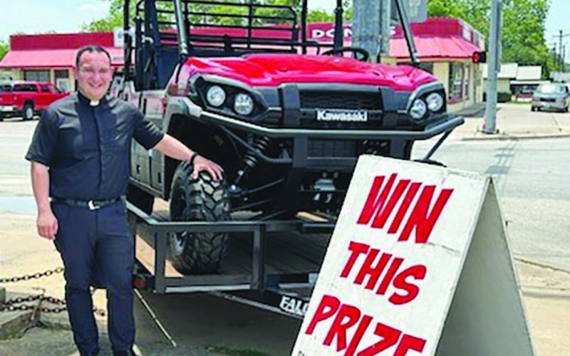 Father Jacob Mendoza is pictured with a 2025 Kawasaki Mule Pro FXT 1000LE, which will be given away at this weekend’s picnic. Included is a Falcon 14 ft. single axle trailer, generously donated by Boehm Tractor Sales. If you would like to purchase a ticket, please call the church office or visit the church’s website, www.sscmshiner.org.