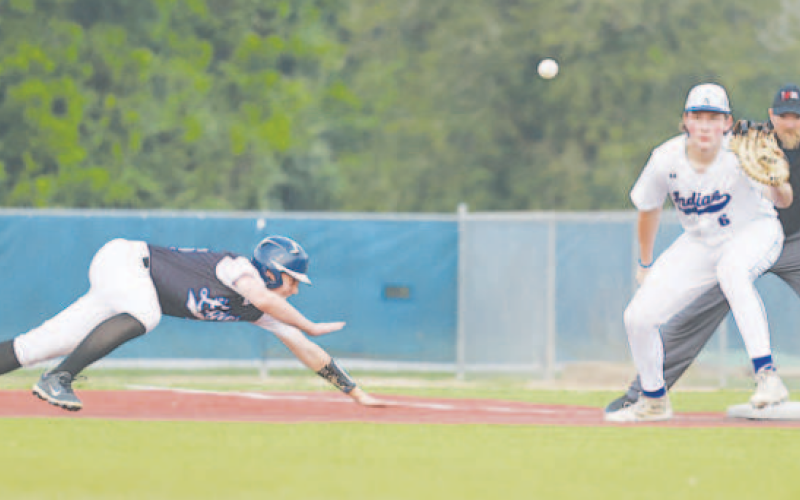 Bowen Hawkins takes the throw on a pick-off of the Eagles Carsten Edelman. Photo by Chuck Grafe