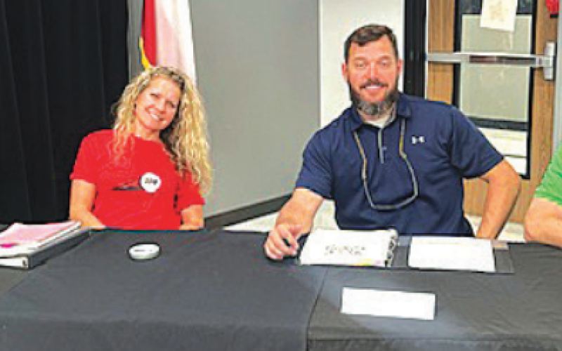 Pictured from left to right are newly appointed board members Sherry Fishbeck, Jill Moore, Cody Maresh and Jordan Dees. Photo by Clayton Kelley