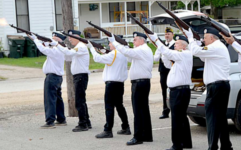 Color guard members of the Lavaca Memorial Veterans of Foreign Wars Post 6382 and the Vietnam Veterans of America Lone Star Chapter 854 conduct a 21-gun salute to conclude Memorial Day ceremonies held at the Sacred Heart Family Center this past Monday. Photo by Jimmy Appelt