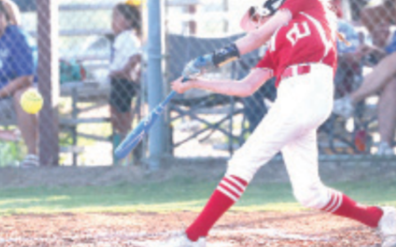 Photo by Chuck Grafe Baye Shimek hits an RBI single in the second inning. Baye had two hits and drew a walk.