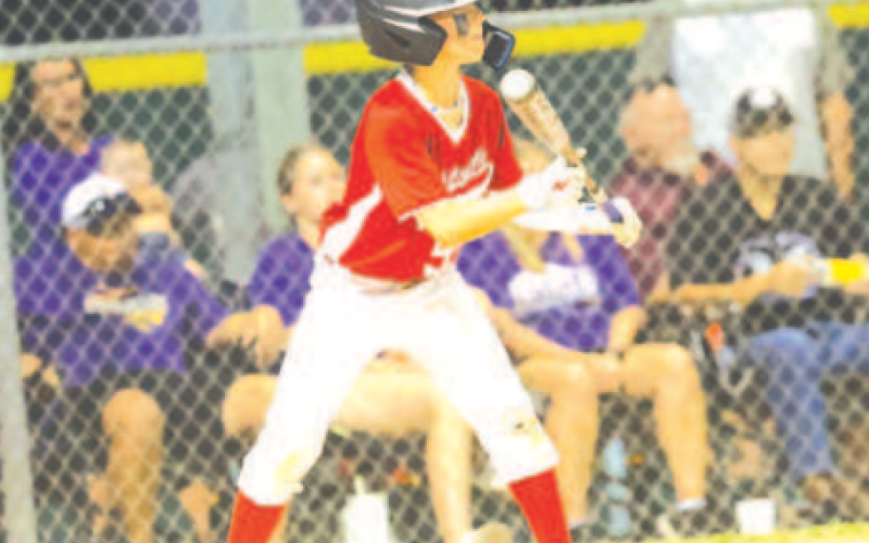 Photo by Chuck Grafe Blake Cliffe attempts a bunt in the victory over Shiner.
