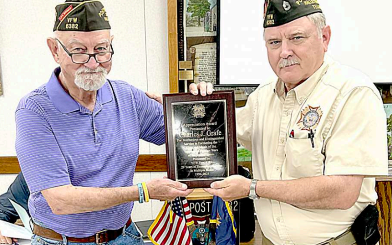 Long-time member of the Lavaca Memorial Veterans of Foreign Wars Post 6382, Chuck Grafe, was recognized Wednesday night, June 11 at its meeting for his meritorious and dedicated service to the organization. Grafe served as its adjutant (secretary) for 29 years and has also held every office in the local VFW, including its Commander from 2015-16. Receiving the honored plaque is Grafe (left) that is being presented by outgoing commander Kevin Bright. Contributed photo
