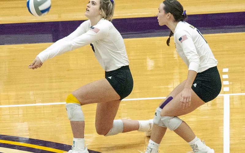 UMBH junior Cameron Pesek (left) receives the ball during a Lady Crusader volleyball match during the 2024 season. Photo courtesy of UMHB Athletic Department.