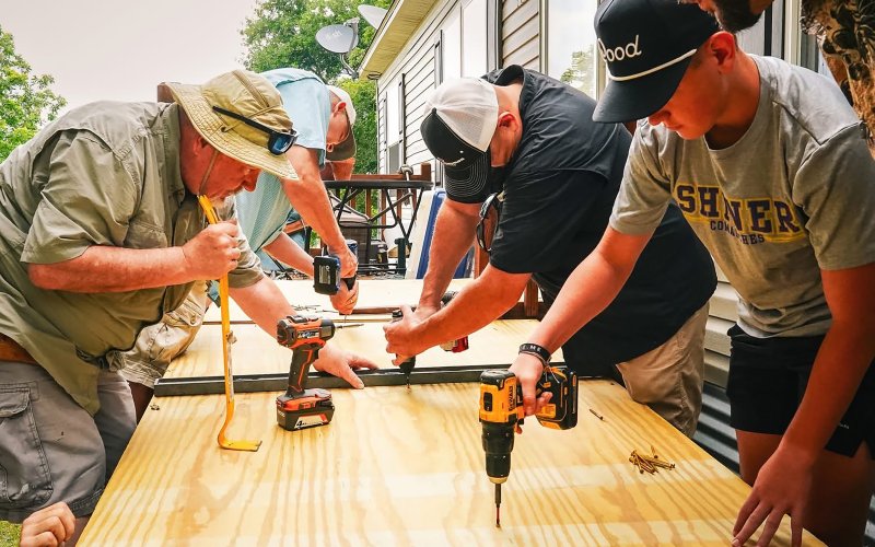 Shown above are members of the Shiner Rotary Club working to build a new handicap wheelchair ramp for a Shiner resident.