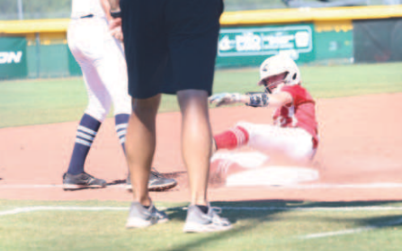 Photo by Chuck Grafe Blair Ranly, sliding into third vs. Louisiana, had two hits in the loss.