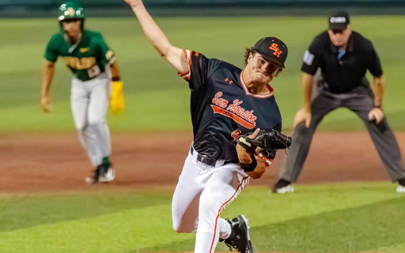 Sam Houston State University pitcher and 2022 St. Paul graduate Zak Johnson throws a pitch in the April 29 home game against Baylor, one of his 21 appearances for the Bearkats during the 2025 season. Photo courtesy of Sarah Kronschnabl.