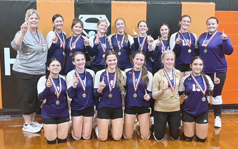 Shiner JV Purple Schulenburg Tournament 2025 champions. Front row from left are Reagan Robles, Savannah Durrett, Taylor Kocian, Madi Hubbard, Tinsley Vasek and Allie Garcia. Back row from left are coach Kristi Peterson, Adalyn Migl, Dannica Beinhauer, Madison Coburn, Alexis Malina, Whitley Lyons, Mallory Johnson, Stella Clifford and Jessica Whiddon. Photo courtesy of Karri Kocian.