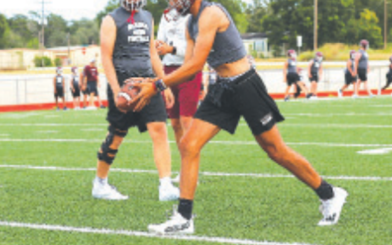 Photo by Chuck Grafe Gavyn Chapa works on his punting in the Monday evening workout.