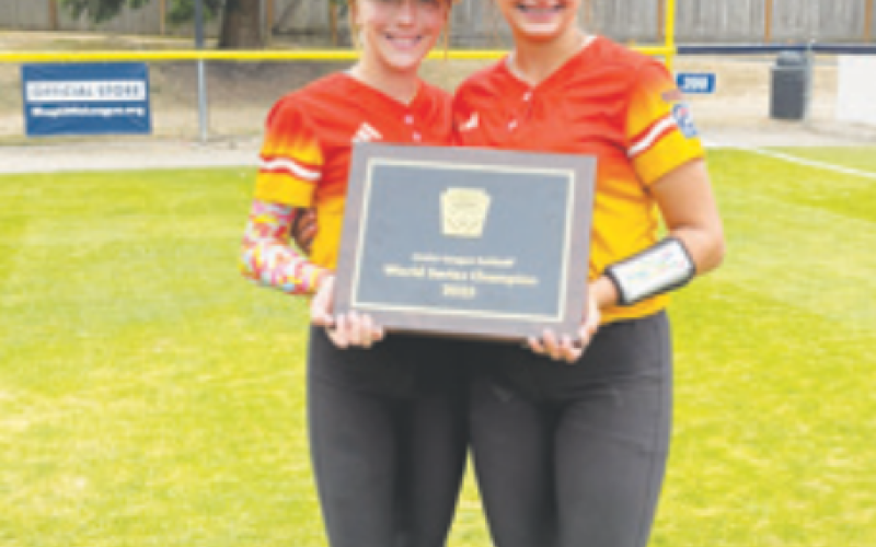 Contributed photo From left, Chloe Grahmann and Paelyn Etzler played a big part in Columbus winning the Jr. Little League World Series.