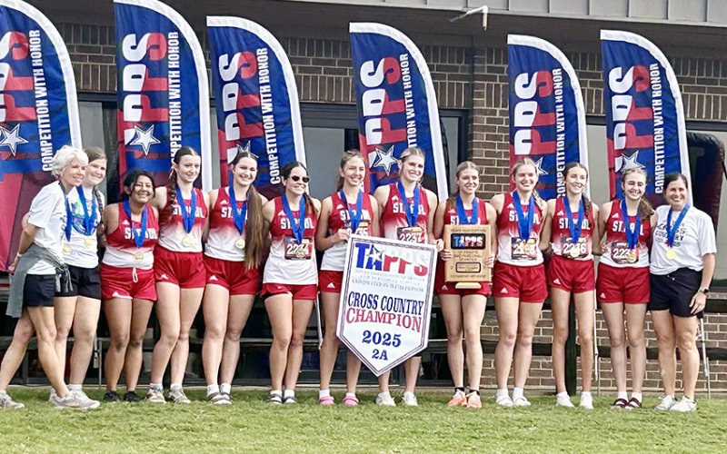 The St. Paul girls cross country team captured the TAPPS 2A state title Monday in Waco. From left are assistant coach Lindsey Morkovsky, Kylie Khelso, Ellie Rodriguez, Reese Chilek, Faith Brown, Clara Kinney, Sally Machacek, Riley Mozisek, Kristin Cerny, Skylar Mozisek, Emma Marshall, Frances FIlip and head coach Nicco Brown. Photo courtesy of Nicco Brown.