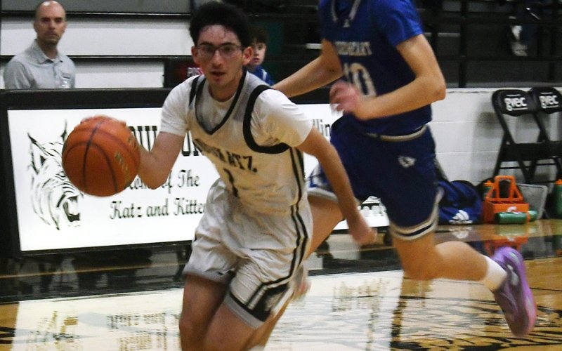 Bryan Fernandez attacks the basket in the second half against Sacred Heart. He notched six points on two triples. Photo by Mark Lube.