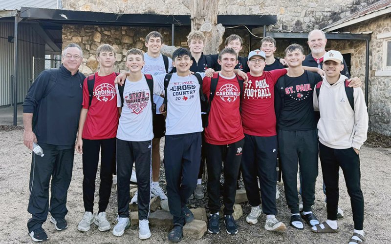 The St. Paul Cardinals boys basketball team get together for a photo after winning the Round-Top Carmine Tournament with a 4-0 record last weekend. Photo courtesy of St. Paul Booster Club.