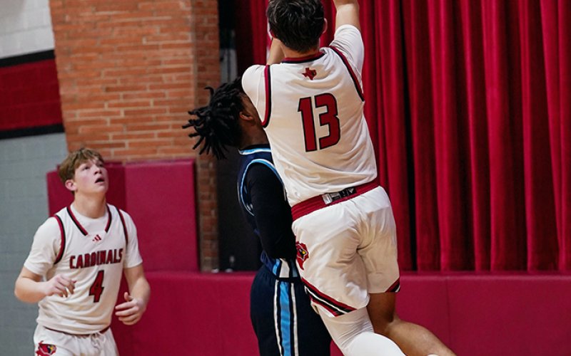 Jack Ehrig makes a jump shot again Bracken. He led the Cardinals with 21 points. Photo courtesy of Photos by Lori Raabe.