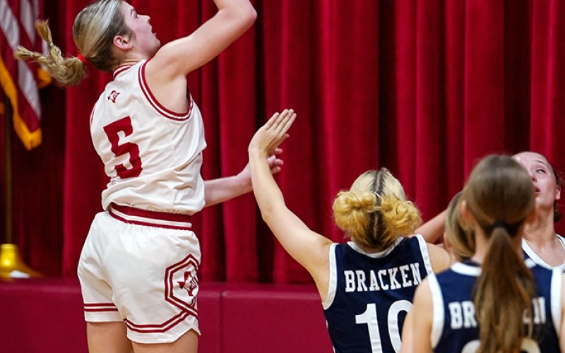 Skylar Mozisek with a second-half shot attempt Thursday against Bracken. She scored 17 points. Photo courtesy of Photos by Lori Raabe.