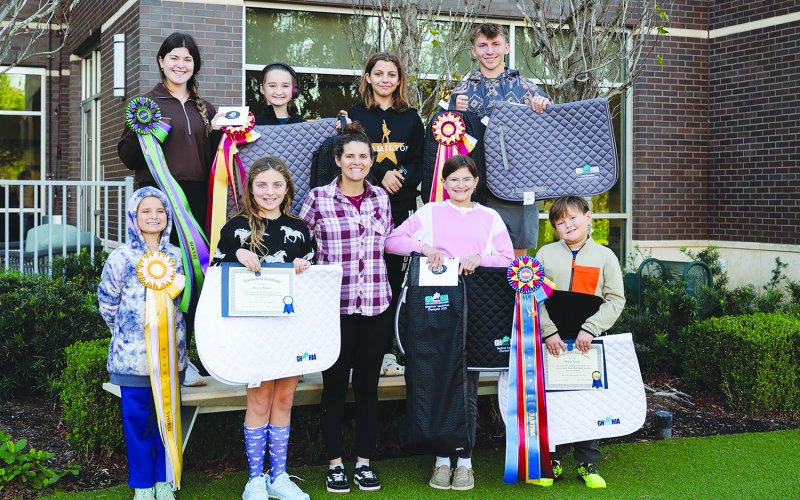 Pictured are, top row, left to right, Grace Nevlud, Dani Starkey, Hattie Cinadr and Cade Shimek; bottom row, left to right, Avery Starkey, Dawsyn Shimek, Samantha Starkey, Aubrey Nevlud and Holdyn Nevlud.