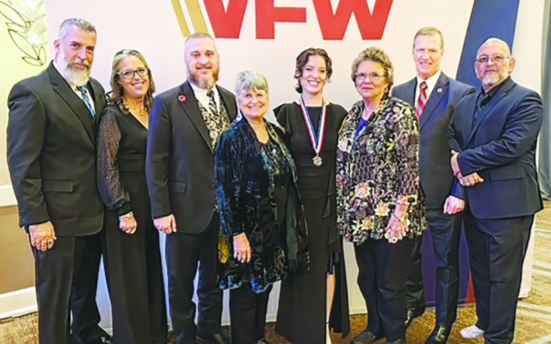 Pictured, left to right, Michael Collins, Sarah Collins, Dave Walden (Texas VFW Commander), Barb Koehn (District 24 Auxiliary President), Madeline Collins, Barbara Hartman (District 24 Auxiliary Secretary and the Auxiliary Scholarship Chair),  Kenneth O. Preston (13th SMA(R)) and Andy Rosales (District 24 Commander).